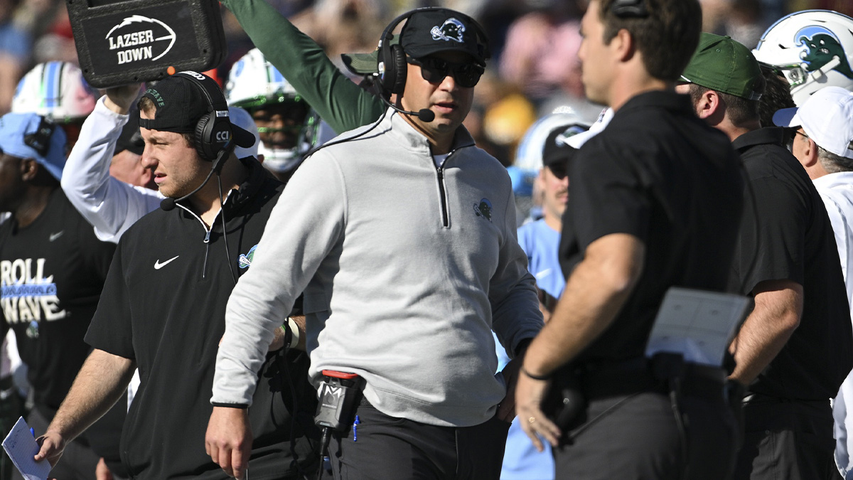 Tulane Green Wave head coach Jon Sumrall walks down the sidelines during the first half against the Navy Midshipmen at Navy-Marine Corps Memorial Stadium.