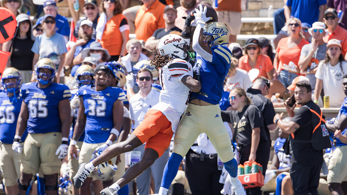 Tulsa Golden Hurricane wide receiver Joseph Williams (8) cannot catch a pass against Oklahoma State Cowboys cornerback Kale Smith (10) during the third quarter at Skelly Field at H.A. Chapman Stadium.