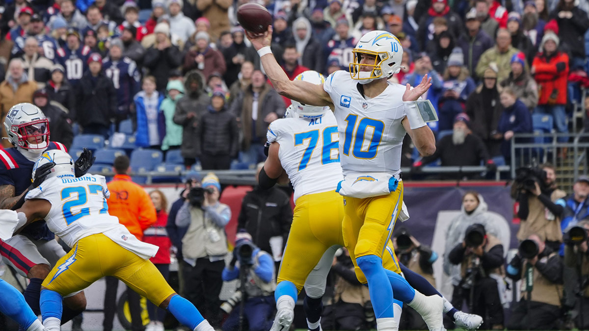 Los Angeles Chargers quarterback Justin Herbert (10) throws the ball against the New England Patriots during the first half at Gillette Stadium.