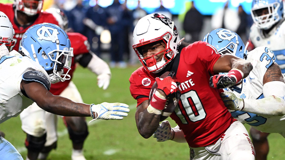 North Carolina State Wolfpack receiver KC Concepcion (10) runs the ball against the North Carolina Tar Heels during the second half at Carter-Finley Stadium.
