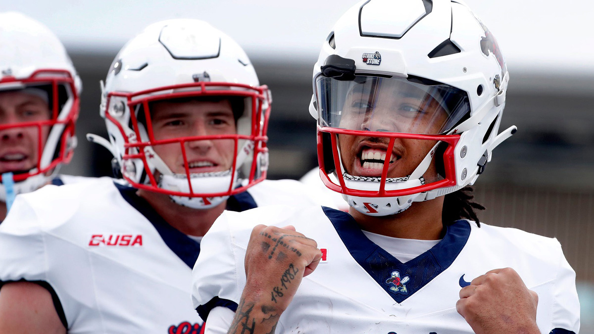 Liberty quarterback Kaidon Salter (7) celebrates his touchdown against Middle Tennessee during the Salute to Veterans & Armed Forces game at MTSU