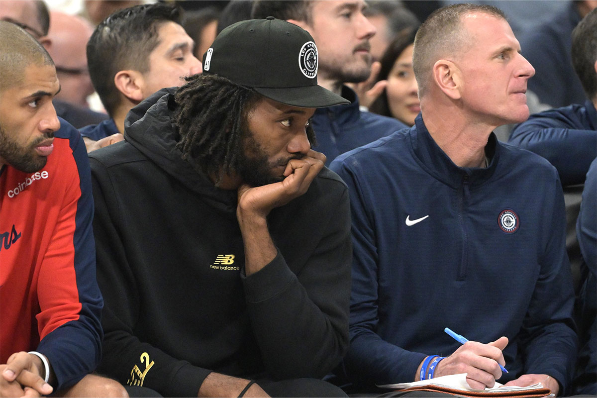 Los Angeles Clippers forward Kawhi Leonard (2) looks on from the bench in the first half against the Orlando Magic at Intuit Dome.