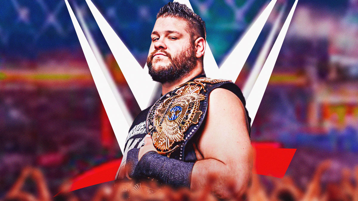 Kevin Owens wearing the Winged Eagles WWE Championship belt in front of the WWE logo.