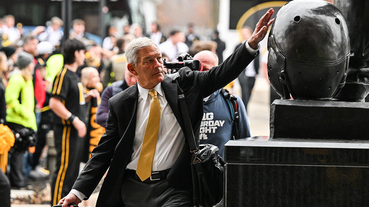 Iowa football head coach Kirk Ferentz enters Kinnick Stadium before the game against the Wisconsin Badgers.