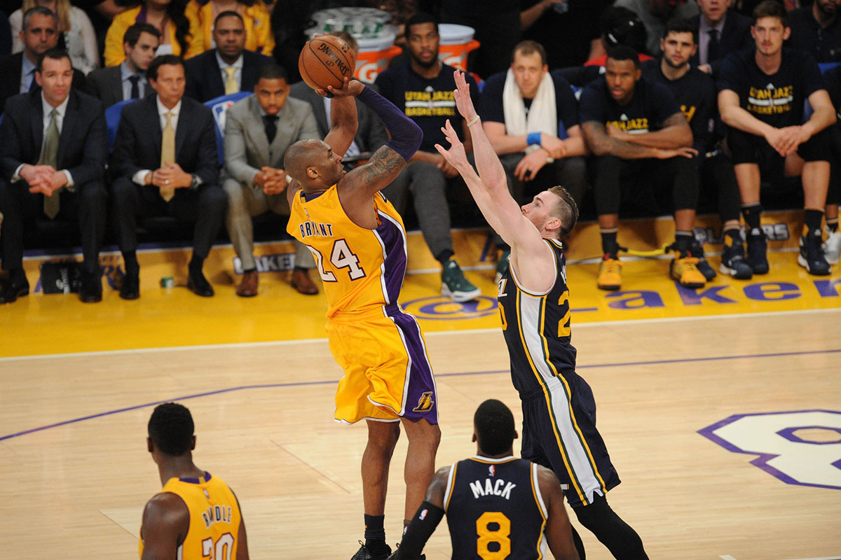 Los Angeles Lakers forward Kobe Bryant (24) shoots over Utah Jazz forward Gordon Hayward (20) in the third quarter at Staples Center. Bryant played in the last game of his 20-year NBA career.