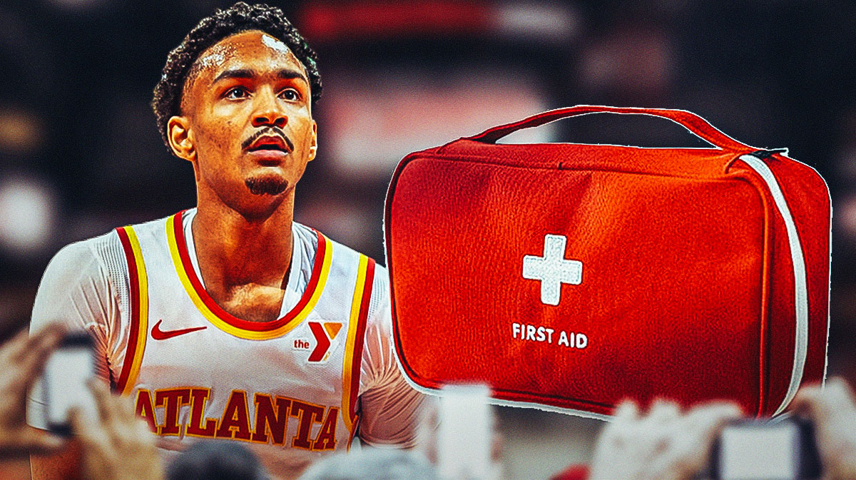 Kobe Bufkin in a Hawks jersey with a first-aid kit.