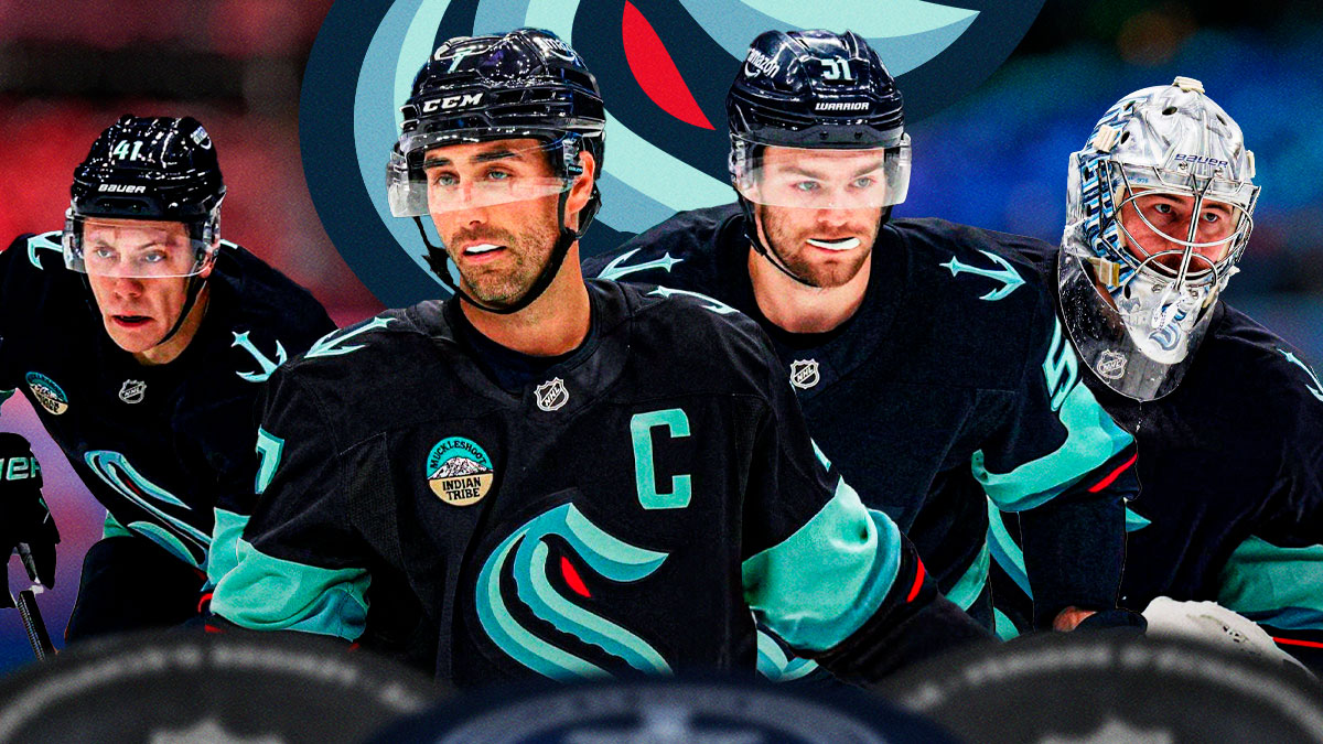 Jordan Eberle, Shane Wright, Philipp Grubauer, Ryker Evans all in action in image, Seattle Kraken logo, hockey rink in background