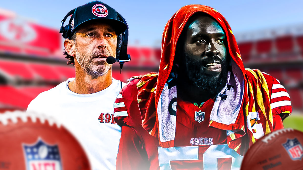 Kyle Shanahan and De'Vondre Campbell in front of the 49ers stadium
