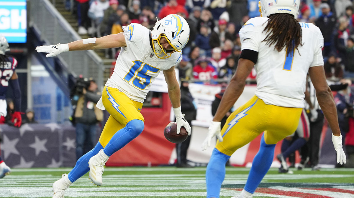 Los Angeles Chargers wide receiver Ladd McConkey (15) celebrates with wide receiver Quertin Johnston (1) after scoring a touchdown against the New England Patriots during the second half at Gillette Stadium. 