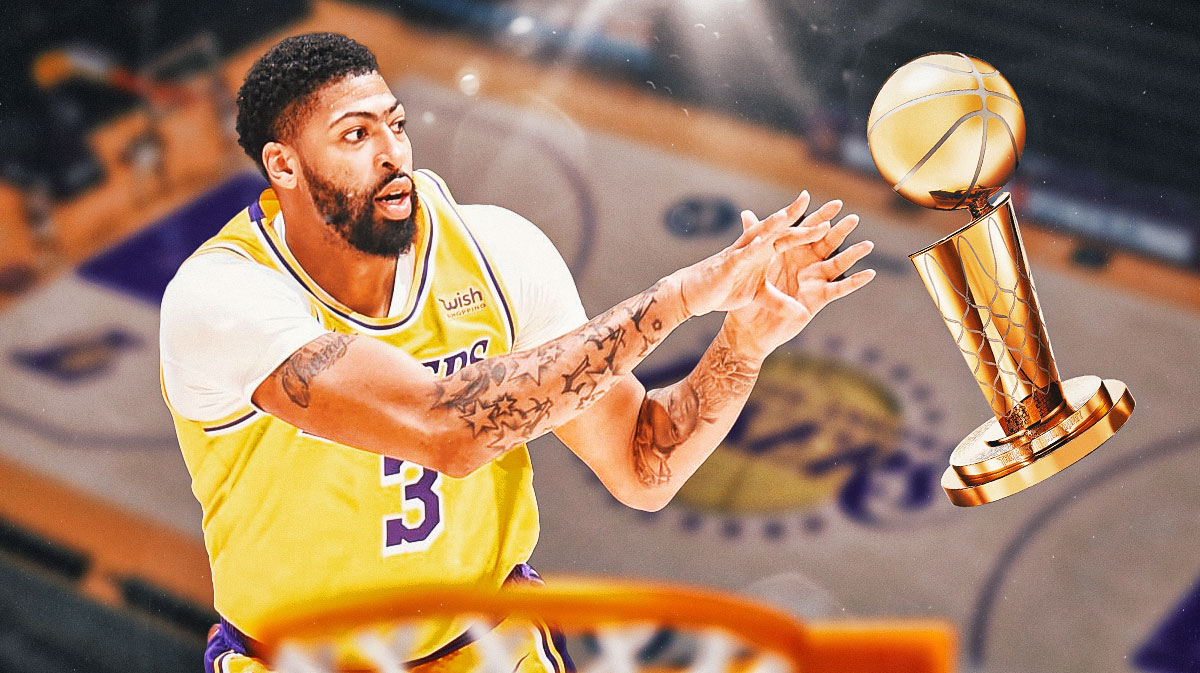 Lakers' Anthony Davis reaching out toward an NBA Finals trophy under a spotlight