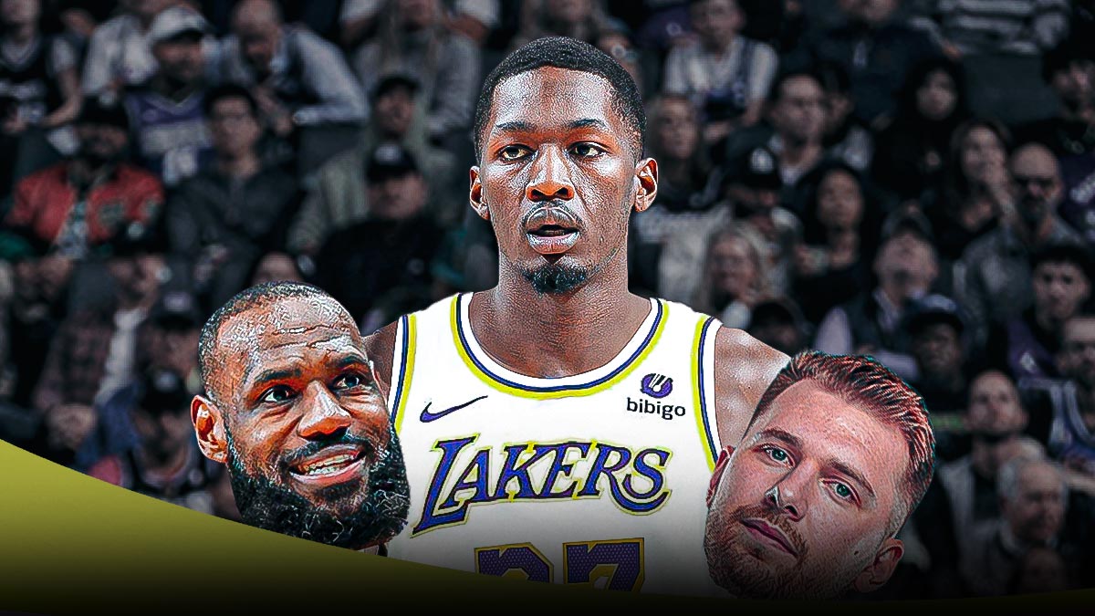Finney Smith holding lebrons head in one hand and lukas head in another