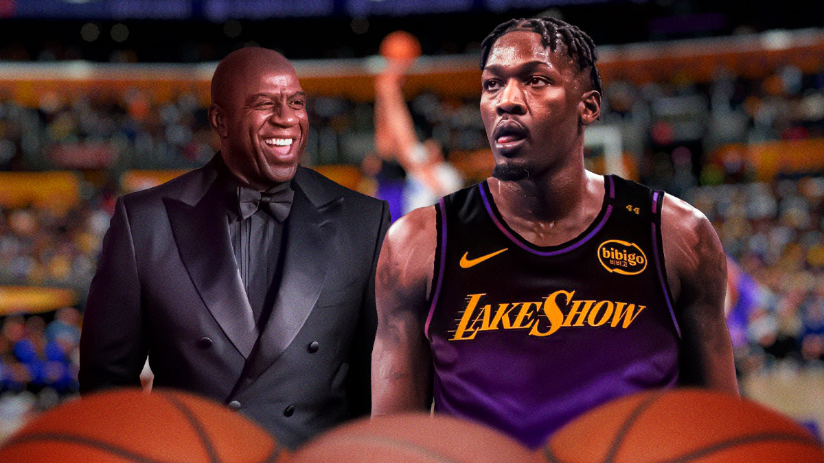 Dorian Finney-Smith in a Lakers jersey and Magic Johnson.