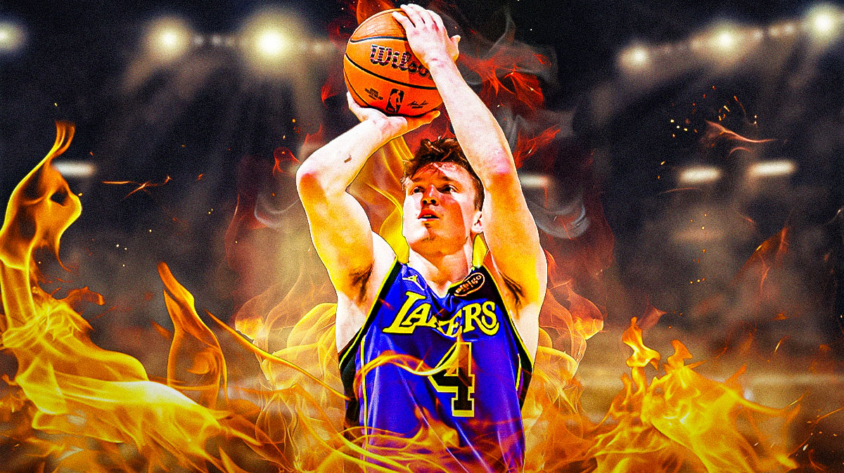 Dalton Knecht shooting a basketball with flames coming off of it