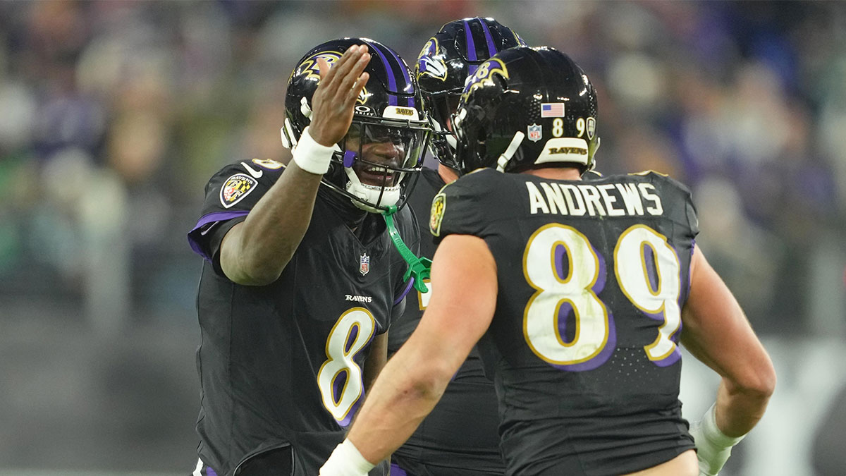 Baltimore Ravens tight end Mark Andrews (89) congratulated by quarterback Lamar Jackson (8) after his first quarter touchdown catch against the Philadelphia Eagles at M&T Bank Stadium.