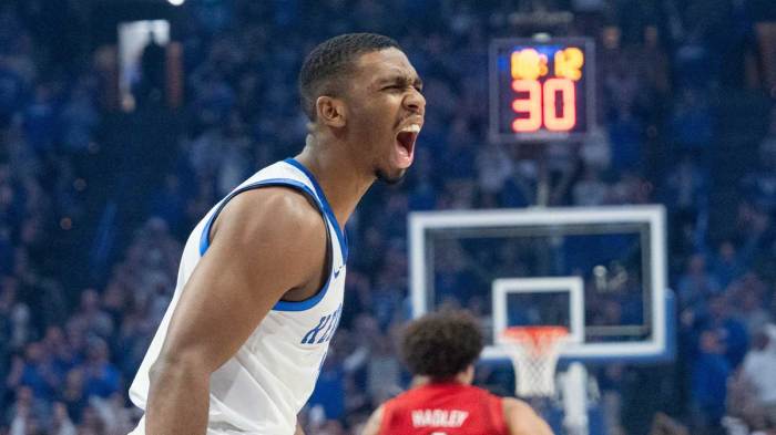 Kentucky Wildcats guard Lamont Butler (1) celebrates after a play during their game against the Louisville Cardinals on Saturday, Dec. 14, 2024 at Rupp Arena in Lexington, Ky.