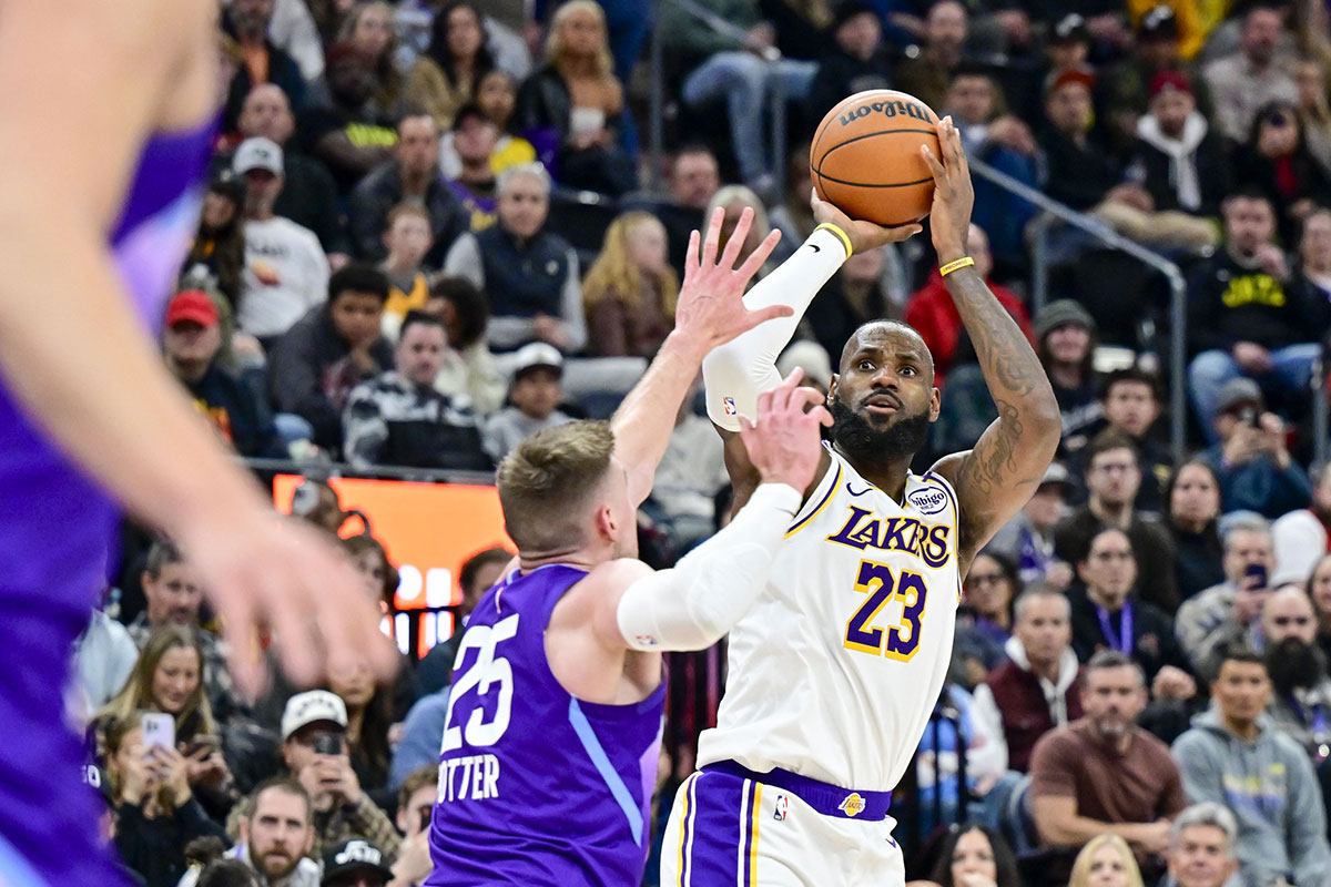 Los Angeles Lakers forward LeBron James (23) shoots over Utah Jazz center Micah Potter (25) during the second half at the Delta Center.