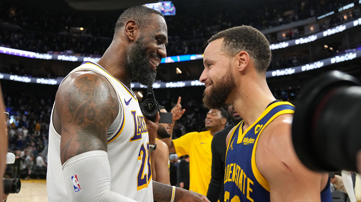 Los Angeles Lakers forward LeBron James (left) and Golden State Warriors guard Stephen Curry (right) greet each other after the game at Chase Center.