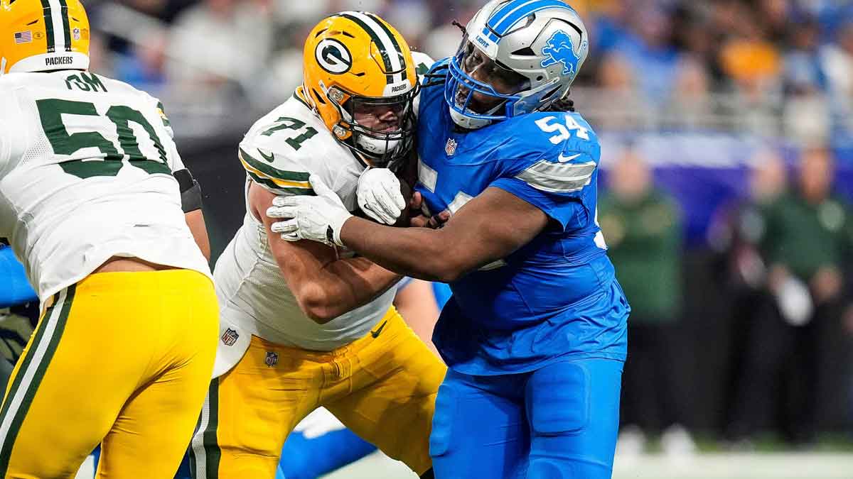 Detroit Lions defensive tackle Alim McNeill (54) pressures Green Bay Packers center Josh Myers (71) during the first half at Ford Field in Detroit on Thursday, Dec. 5, 2024.