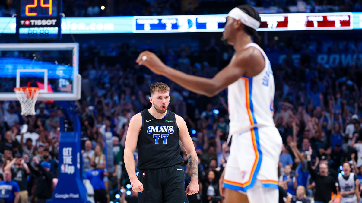 Dallas Mavericks guard Luka Doncic (77) reacts in front of Oklahoma City Thunder guard Shai Gilgeous-Alexander (2) during the second half in game six of the second round of the 2024 NBA playoffs at American Airlines Center.
