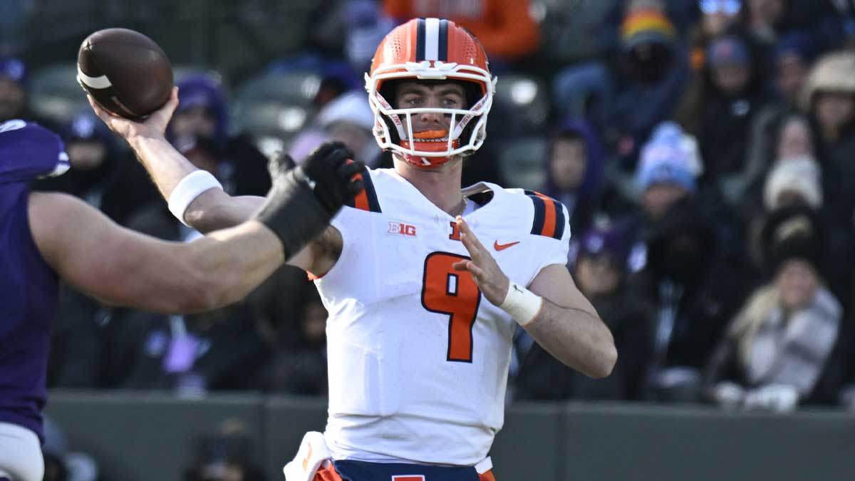 Illinois Fighting Illini quarterback Luke Altmyer (9) passes the ball against Northwestern Wildcats during the first half at Wrigley Field.