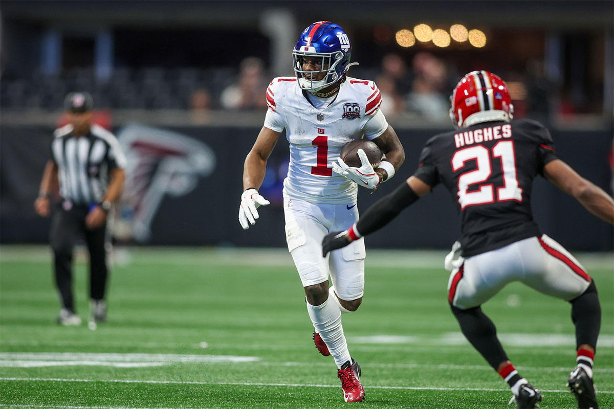 Dec 22, 2024; Atlanta, Georgia, USA; New York Giants wide receiver Malik Nabers (1) runs after a catch against the Atlanta Falcons in the fourth quarter at Mercedes-Benz Stadium.