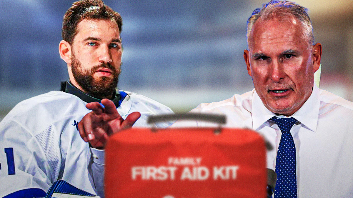 Leafs goalie Anthony Stolarz with a red medical bag in front of him, and frustrated Leafs coach Craig Berube