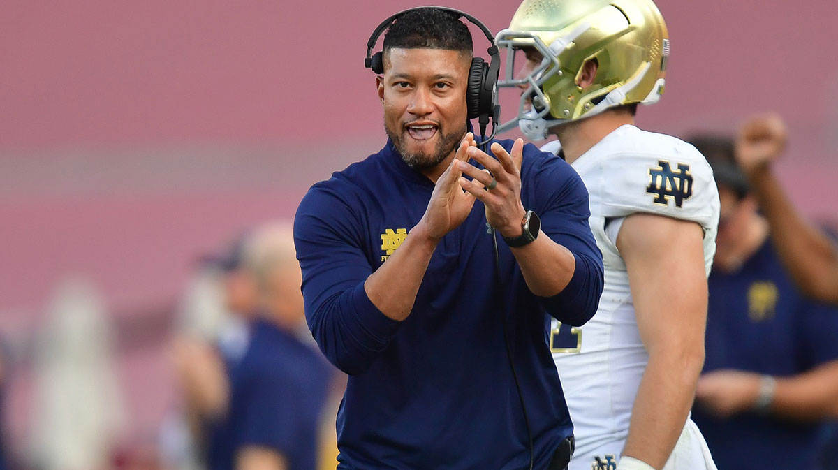 Notre Dame Fighting Irish head coach Marcus Freeman reacts after cornerback Christian Gray (29) blocks a pass against the Southern California Trojans during the second half at the Los Angeles Memorial Coliseum.