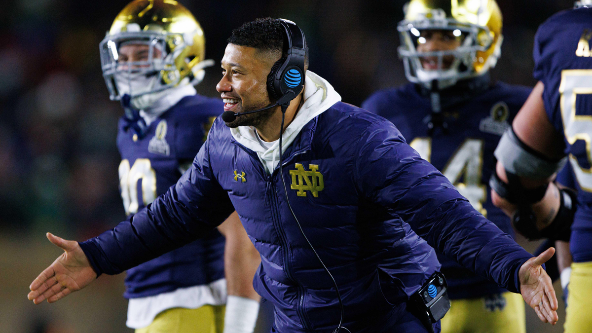Notre Dame head coach Marcus Freeman celebrates a touchdown scored during the first round of the College Football Playoff between Notre Dame and Indiana at Notre Dame Stadium on Friday, Dec. 20, 2024, in South Bend.