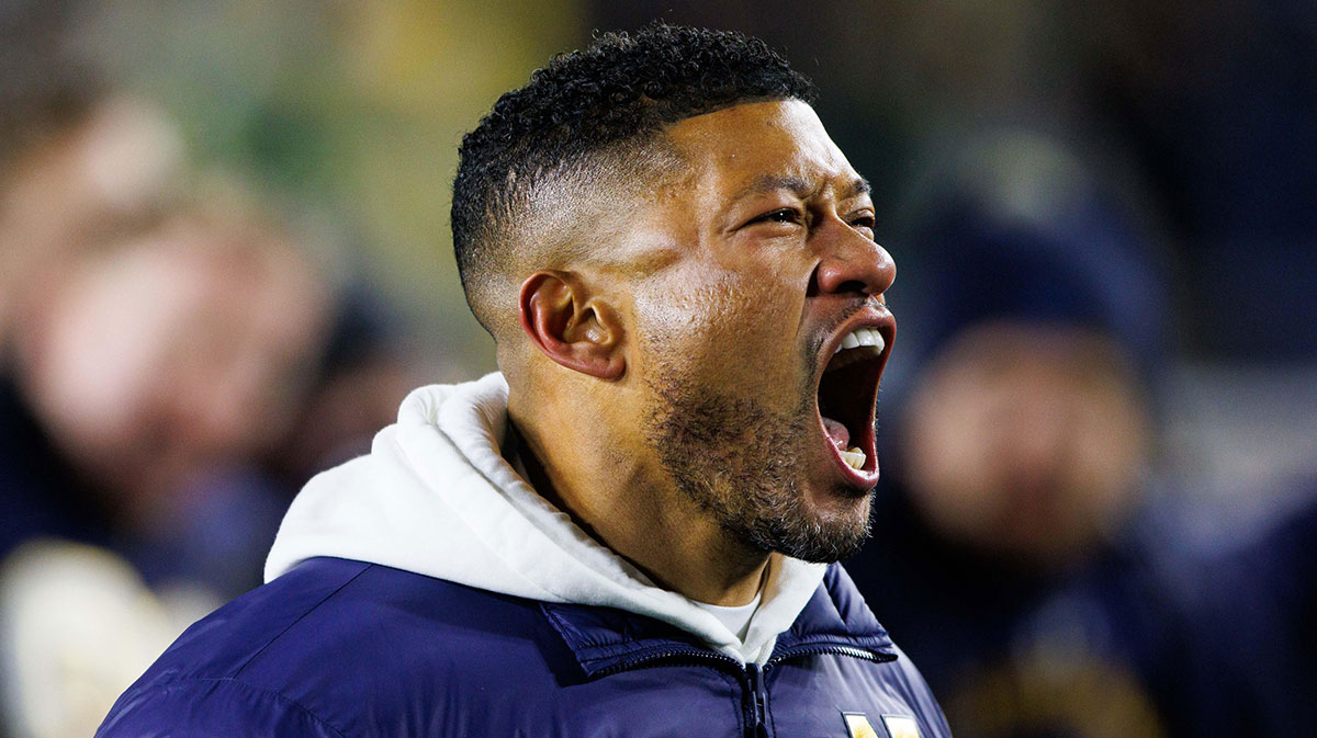 Notre Dame head coach Marcus Freeman celebrates after winning the first round of the College Football Playoff 27-17 against Indiana at Notre Dame Stadium on Friday, Dec. 20, 2024, in South Bend.