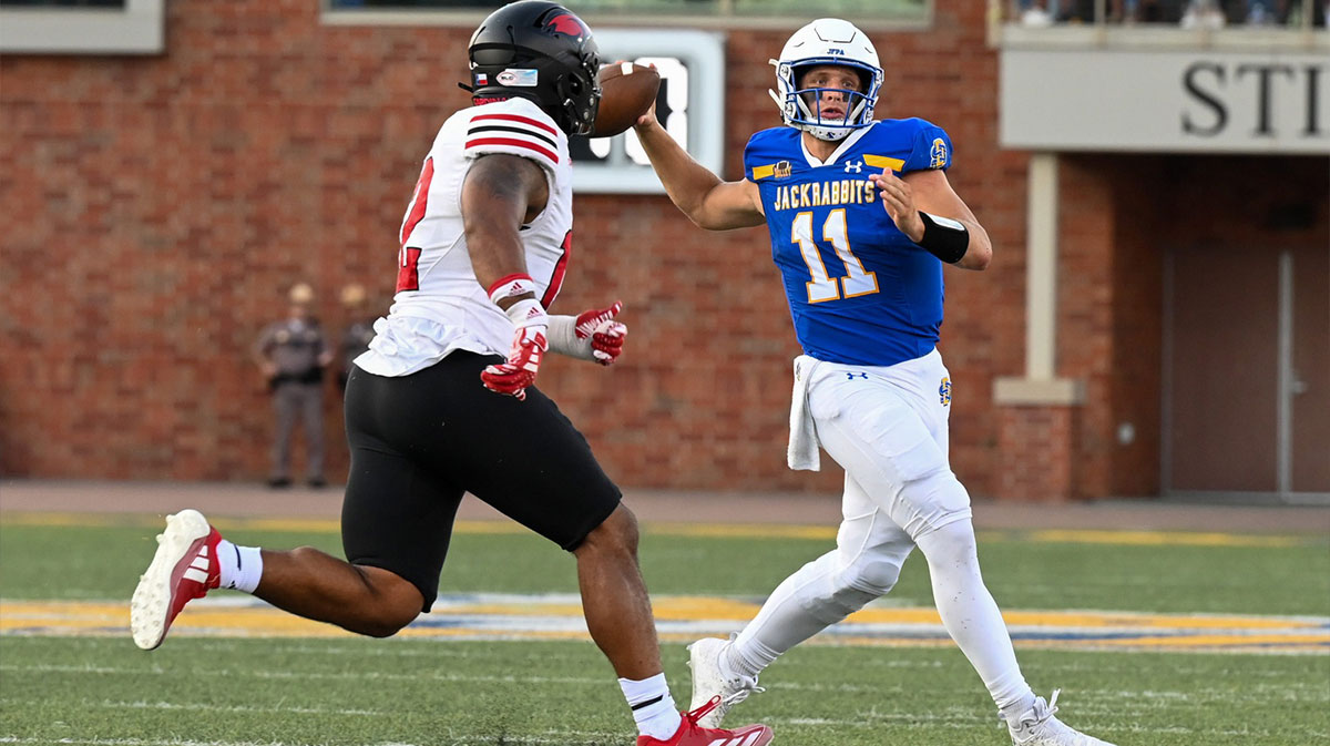Transfer portal South Dakota State quarterback Mark Gronowski (11) goes to throw the ball to a teammate on Saturday, Sept. 7, 2024, at Dana J. Dykhouse Stadium in Brookings.