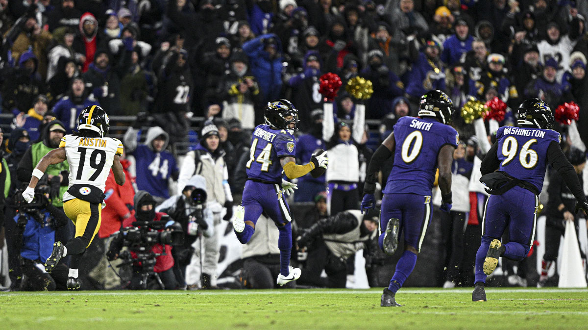 Baltimore Ravens cornerback Marlon Humphrey (44) returns a interception for a touchdown during the second half against the Pittsburgh Steelers at M&T Bank Stadium.