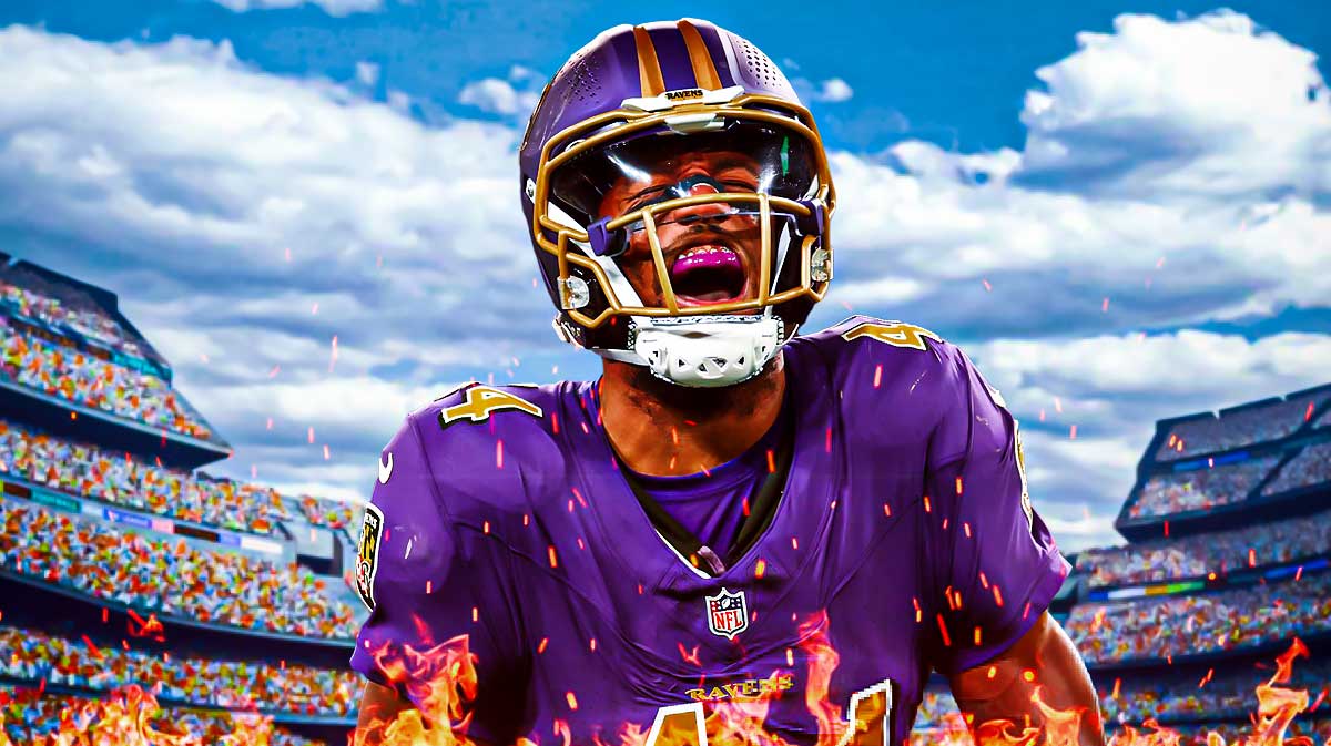 Baltimore Ravens star Marlon Humphrey with fire around him in front of M&T Bank Stadium.