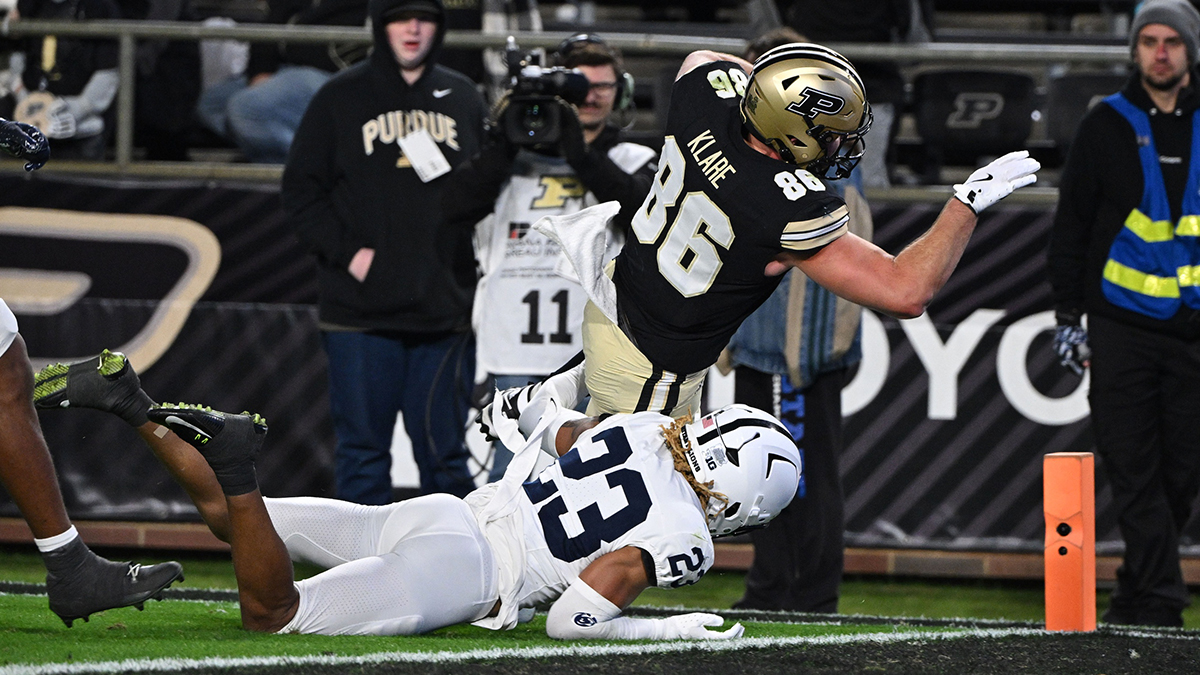 Nov 16, 2024; West Lafayette, Indiana, USA; Penn State Nittany Lions cornerback Antoine Belgrave-Shorter (23) tackles Purdue Boilermakers tight end Max Klare (86) in the end zone for a touchdown during the second half at Ross-Ade Stadium.
