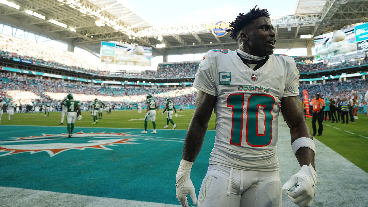 Miami Dolphins wide receiver Tyreek Hill (10) celebrates after defeating the New York Jets during overtime at Hard Rock Stadium.