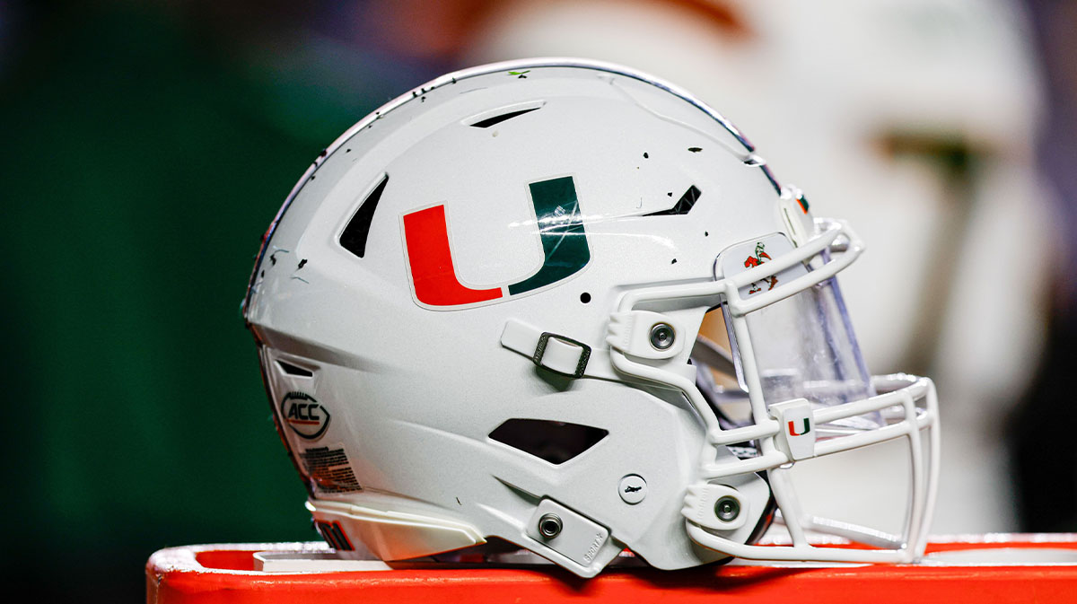 Miami Hurricanes helmet sits on bench as the Hurricanes play against the North Carolina Tar Heels at Kenan Memorial Stadium.