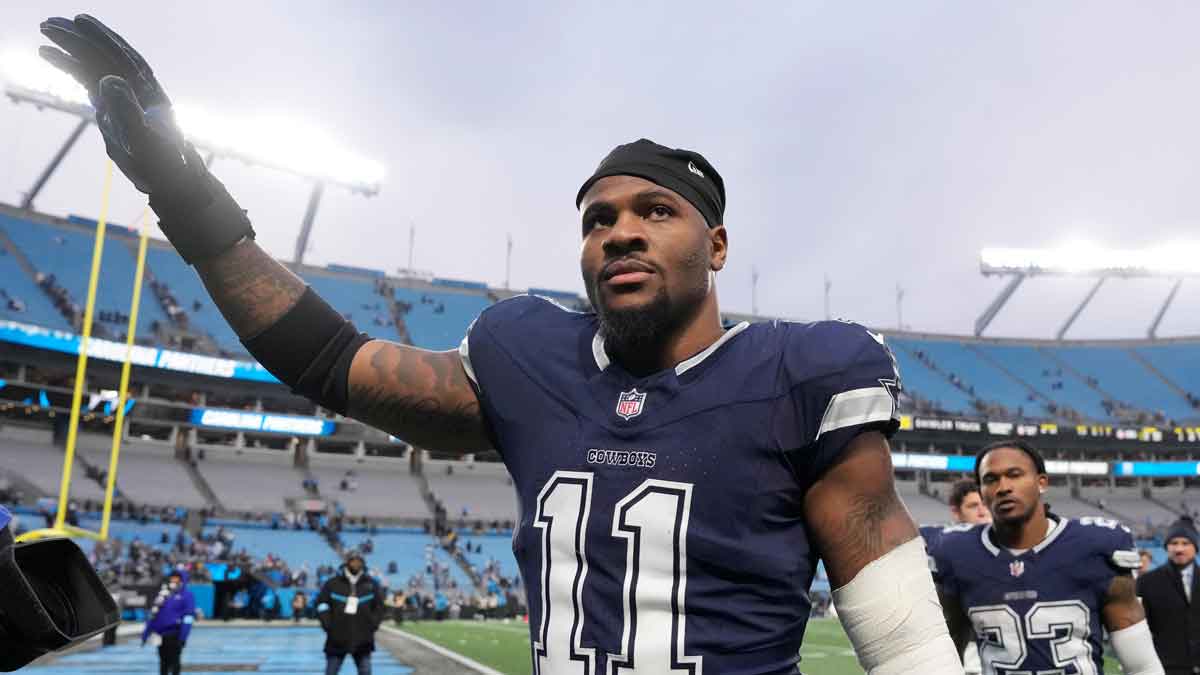 Dallas Cowboys linebacker Micah Parsons (11) walks off the field after the game at Bank of America Stadium. 