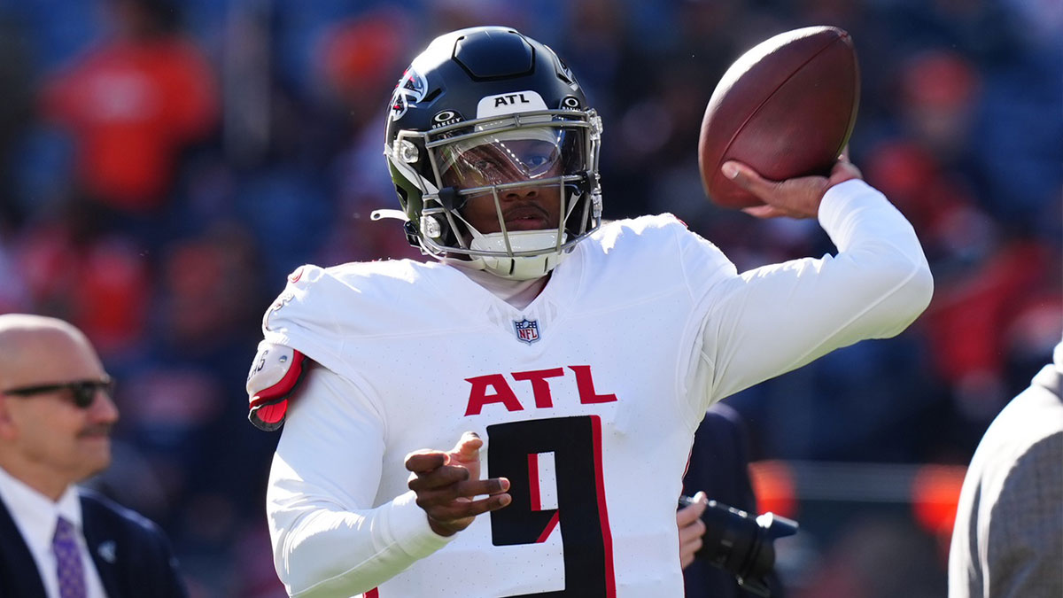 Atlanta Falcons quarterback Michael Penix Jr. (9) warms up before the game against the Denver Broncos at Empower Field at Mile High.