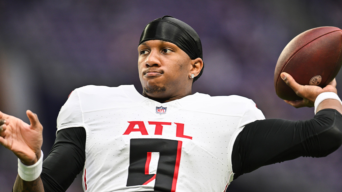 Atlanta Falcons quarterback Michael Penix Jr. (9) warms up before the game against the Minnesota Vikings at U.S. Bank Stadium.