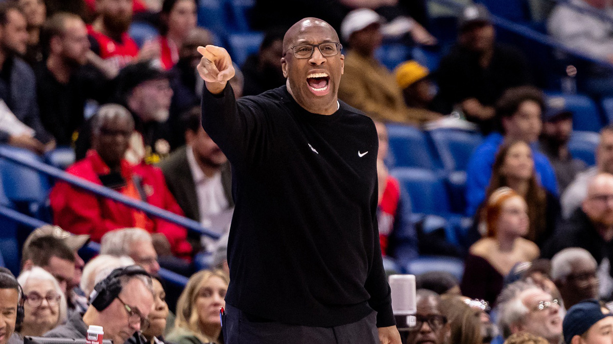 Sacramento Kings head coach Mike Brown gives direction as he stands on the court against the New Orleans Pelicans during the first half at Smoothie King Center.