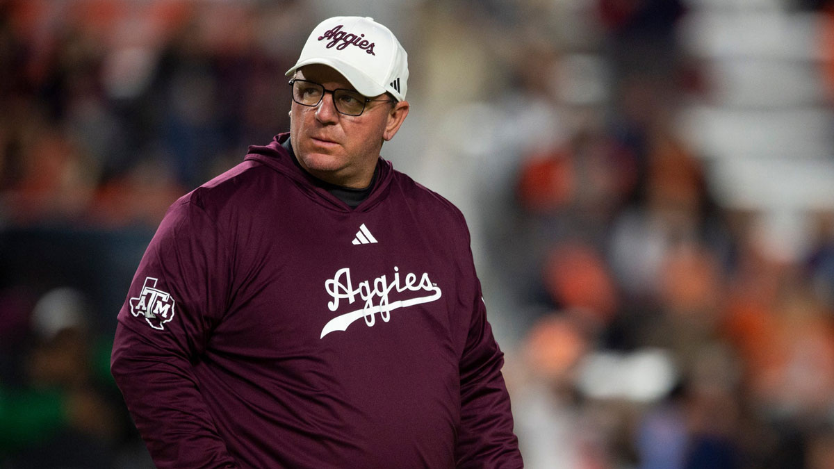 Texas A&M Aggies head coach Mike Elko during warm ups before Auburn Tigers take on Texas A&M Aggies at Jordan-Hare Stadium in Auburn, Ala., on Saturday, Nov. 23, 2024.