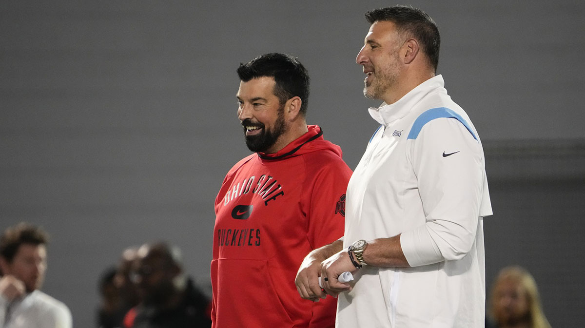 Ohio State football head coach Ryan Day talks to Tennessee Titans head coach Mike Vrabel during the football pro day at the Woody Hayes Athletic Center in Columbus, Ohio.