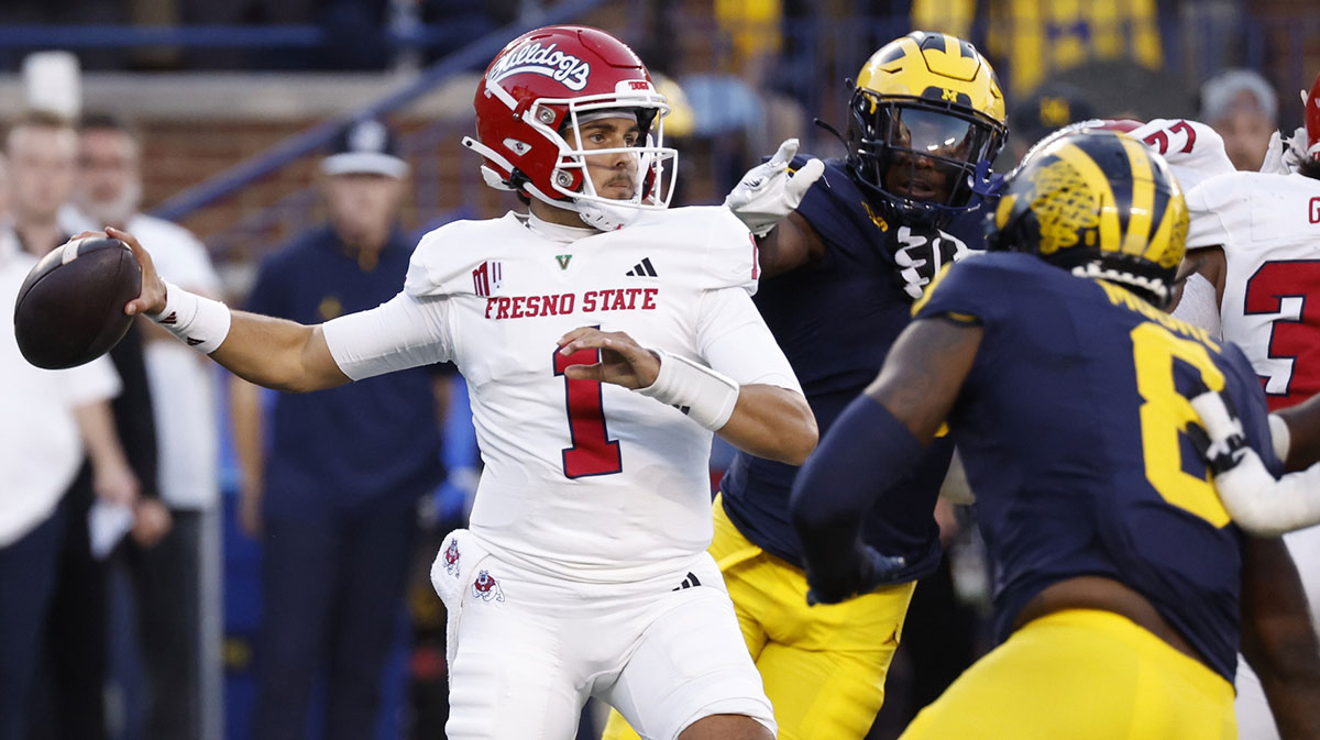 Fresno State Bulldogs quarterback Mikey Keene (1) drops back to throw against the Michigan Wolverines in the first half at Michigan Stadium.