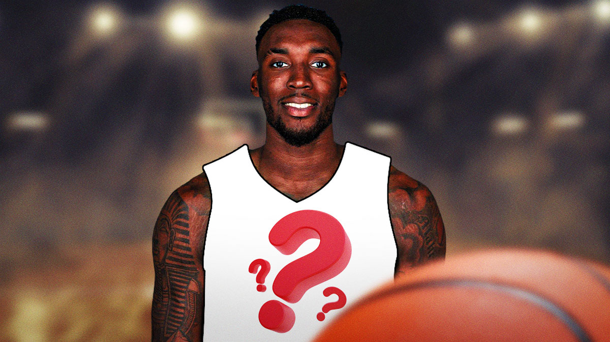 Nassir Little in a jersey with a question mark on it.