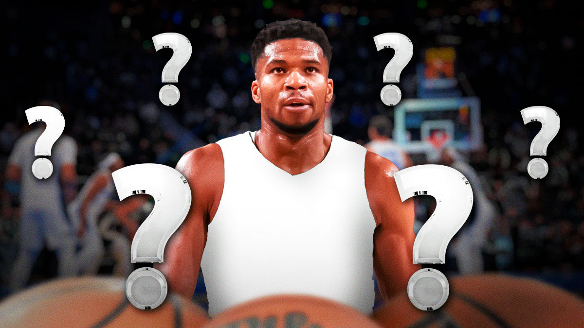 Giannis Antetokounmpo in a blank jersey surrounded by question marks.