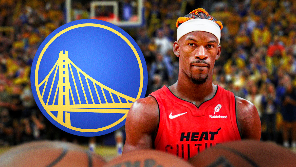 Heat forward Jimmy Butler next to Warriors logo