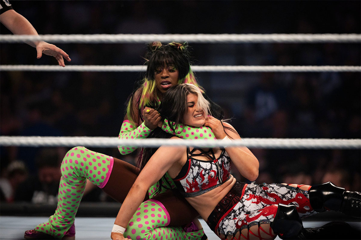 Naomi wrestling Blair Davenport at WWE event.