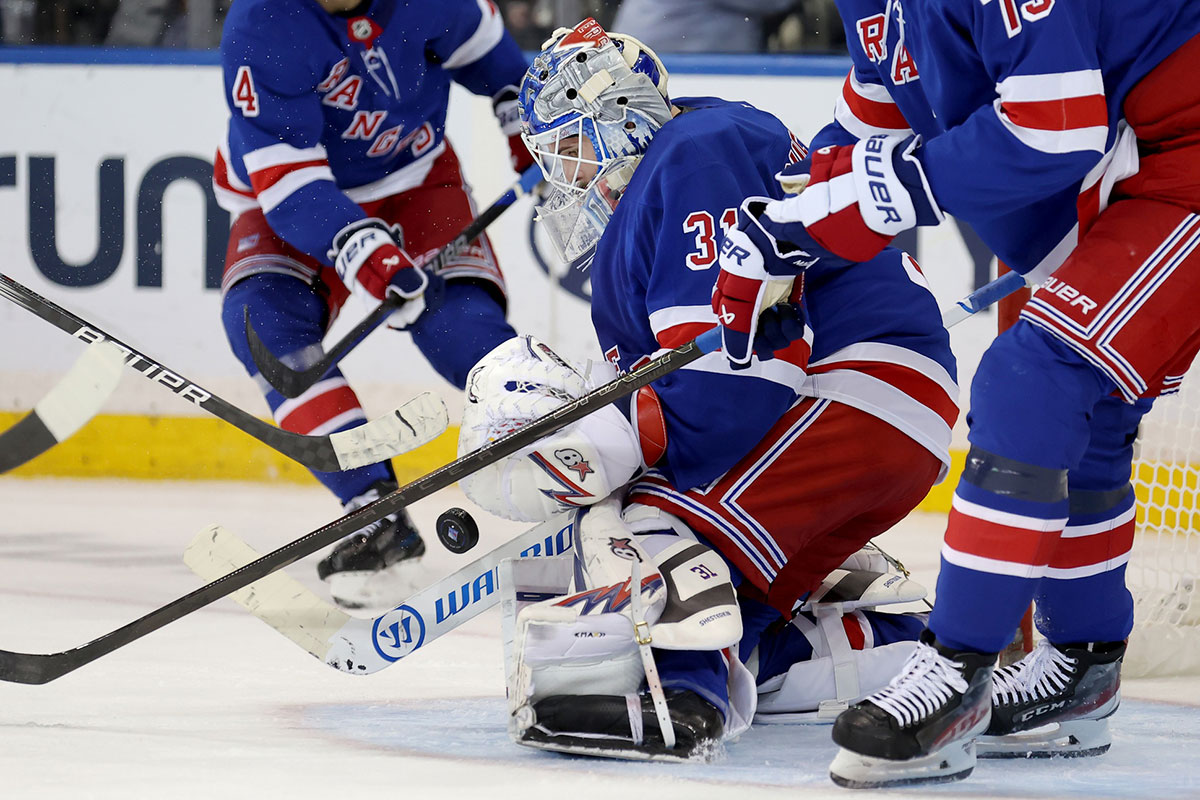 New York Rangers goaltender Igor Shesterkin (31) makes a save against the Chicago Blackhawks during the second period at Madison Square Garden.