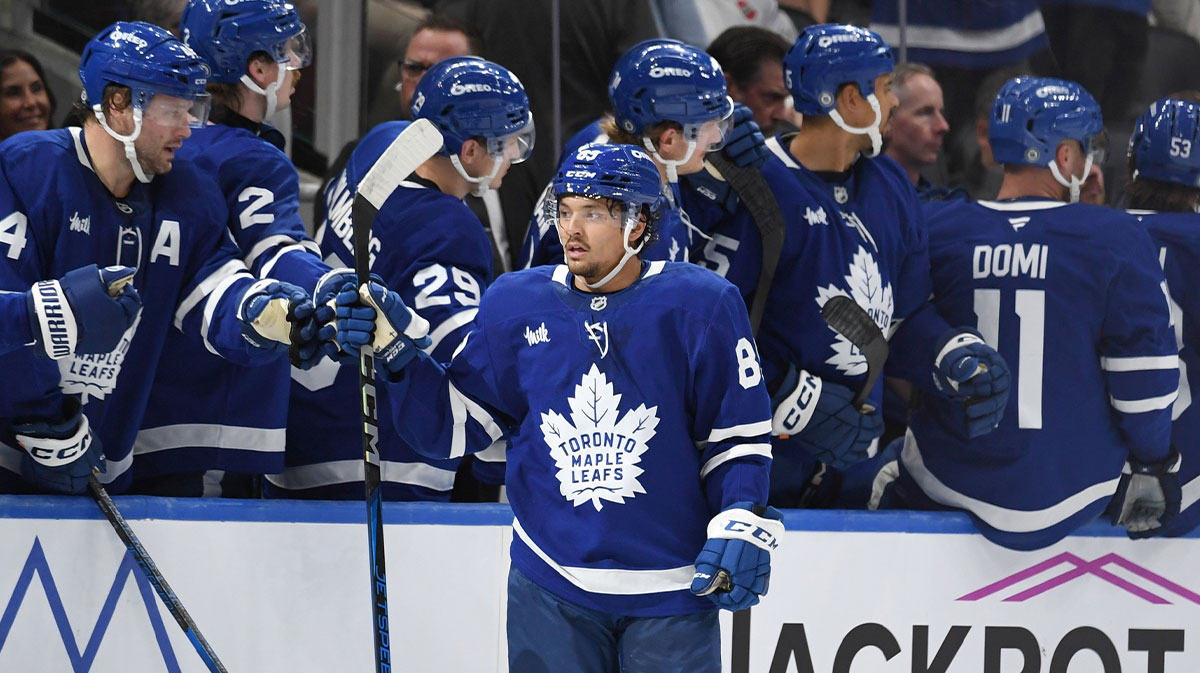oronto Maple Leafs forward Nick Robertson (89) celebrates with team mates at the bench after scoring a goal against the Montreal Canadiens in the second period at Scotiabank Arena.
