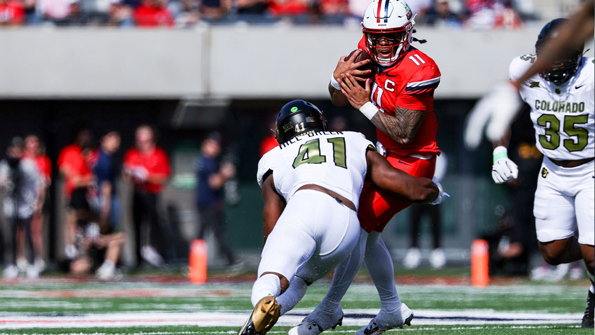 Colorado Buffaloes inside linebacker Nikhai Hill-Green (41) sacks Arizona Wildcats quarterback Noah Fifita (11) during the second quarter at Arizona Stadium.