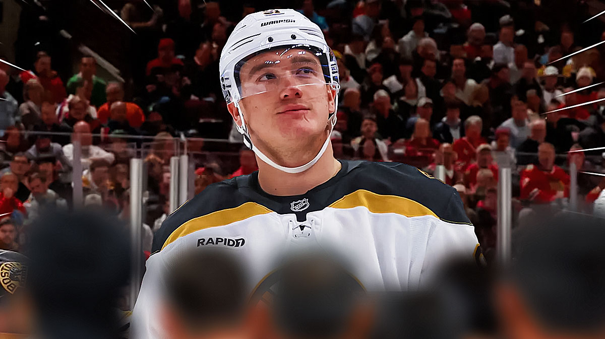 Smiling Bruins defenseman Nikita Zadorov and booing Calgary Flames fans inside the Saddledome